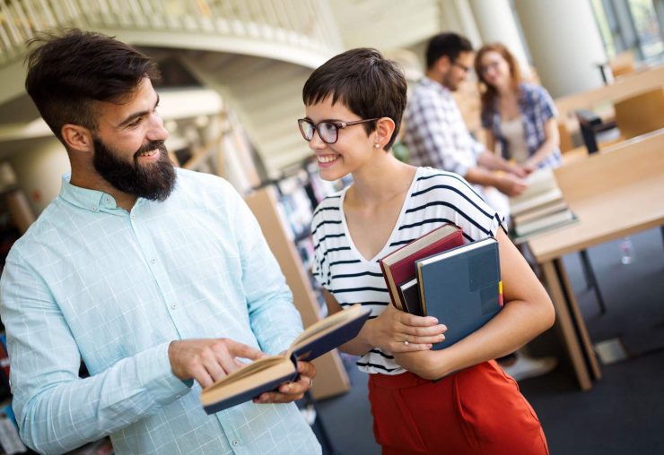 group-of-college-students-studying-at-library-SC9PWKV.jpg